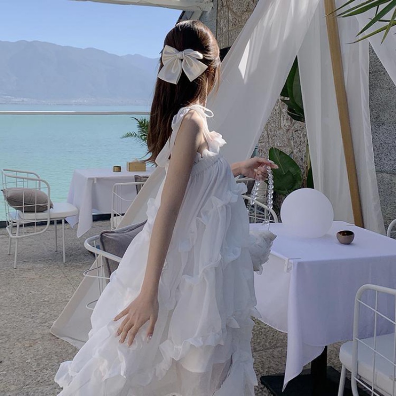 21年连衣裙女夏天裙子 甜美超仙不规则吊带连衣裙宽松显瘦ins超火海边