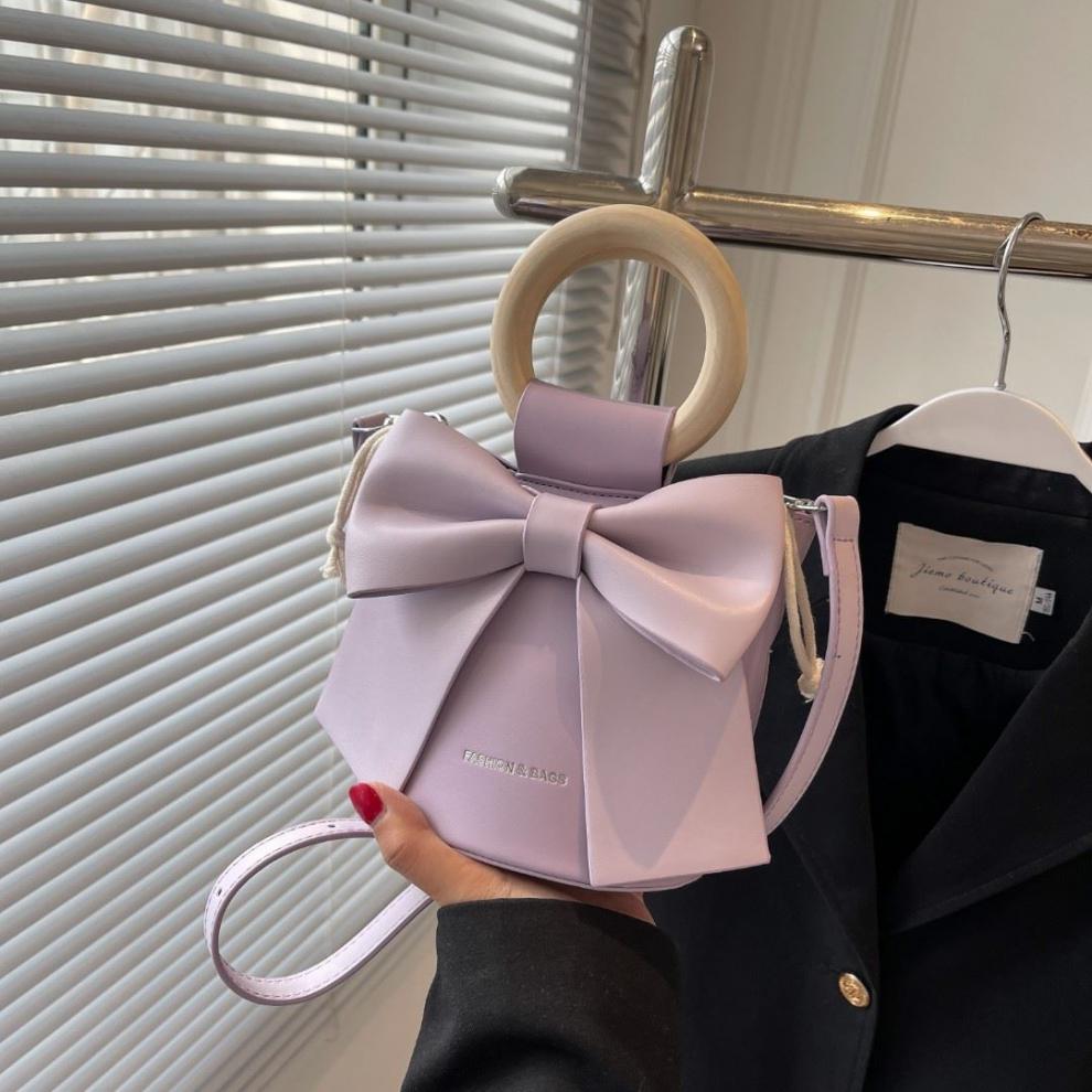 抖音同款艾米兔女包小众蝴蝶结包包女2022新款斜挎水桶包时尚质感手提