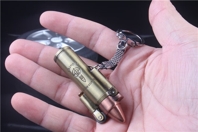 义乌小商品馆新奇特创意个性子弹头模型金属充气打火机多功能挂件砂轮