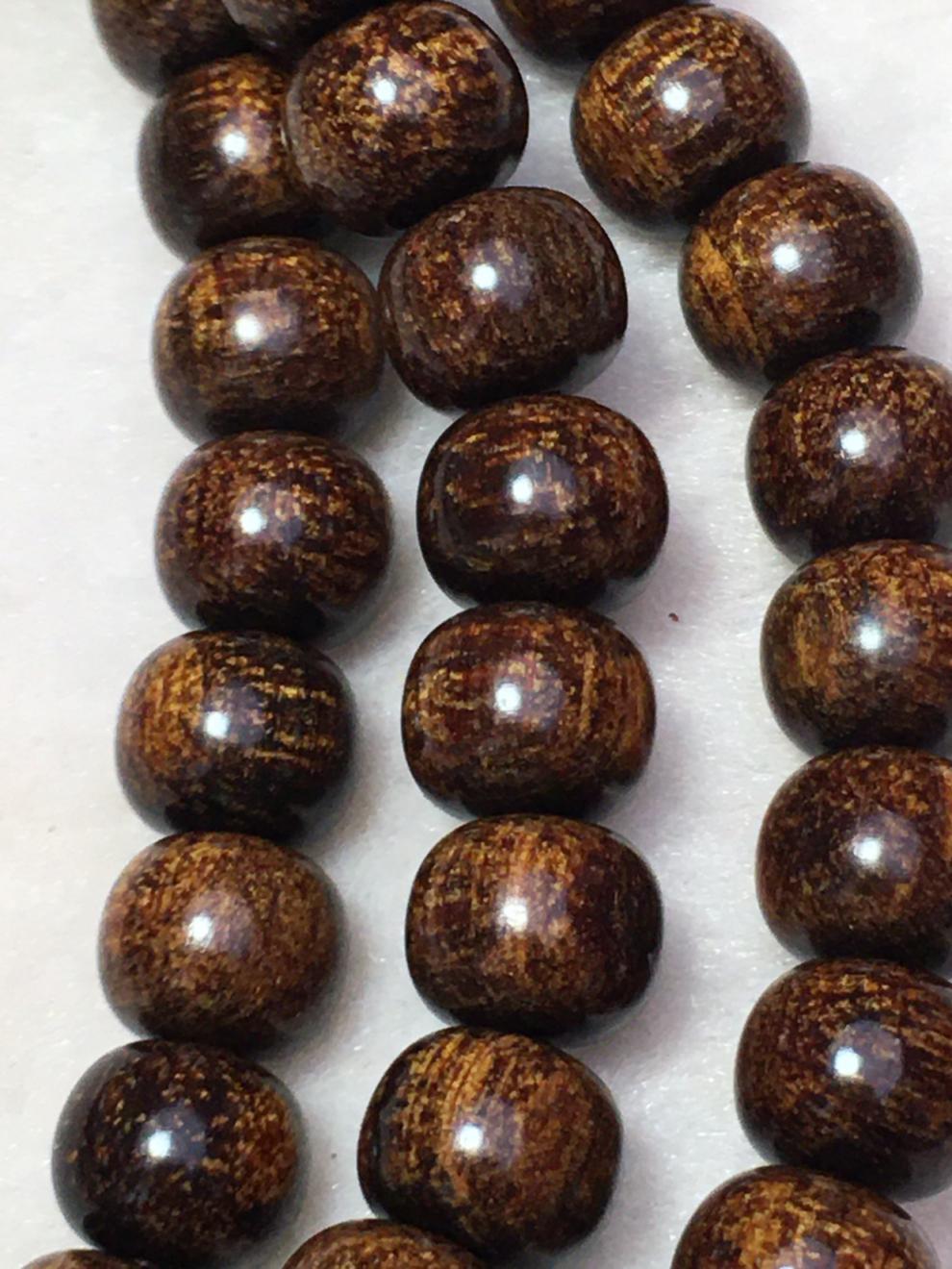 贡木沉香手串巴布亚贡木沉香手串血月玉化老料暗夜龙鳞纹犀角黑油8*9*