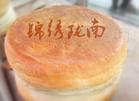 甘肃乞巧故里西和锅盔馍馍传统工艺手工制作现做现卖