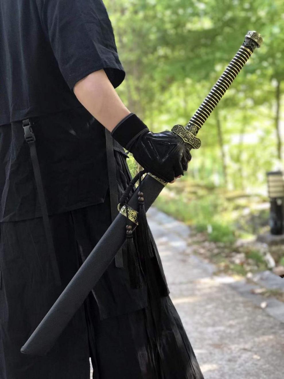 龙湶市金属唐撗刀一体猛钢秀春刀宝剑黑金古刀剑防身冷兵噐未开刃绿色