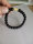 The material of the black agate is authentic, the color is pure, the beads are very round, the gloss is particularly good, the bracelet is finely crafted, the gold brave and black agate are also very good, I am very satisfied.