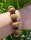 The size of the bracelet is even, very round, full of particles, and the material is very solid. Mani seeds and dzi beads match very well. It has a retro feeling and the price is affordable. Overall, I am very satisfied. It is high-end and classy when worn.