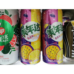 美年达可乐 mirinda 百香果菠萝味 果味汽水 低糖酸甜 细长罐 碳酸