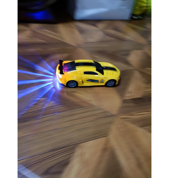 赟娅儿童电动变形赛车玩具警车万向灯光音乐机器人男孩汽车模型 黄色警车