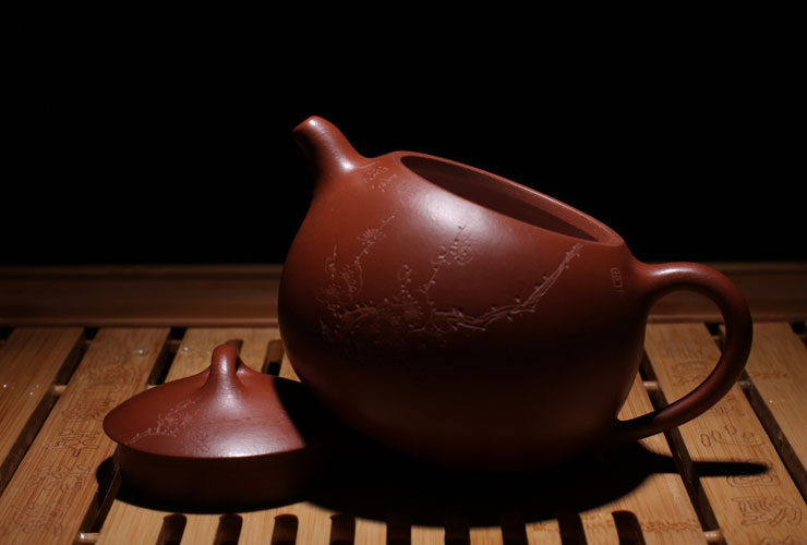 00g 商品产地:中国大陆 材质:紫砂 容量:300-399ml 如果您发现商品