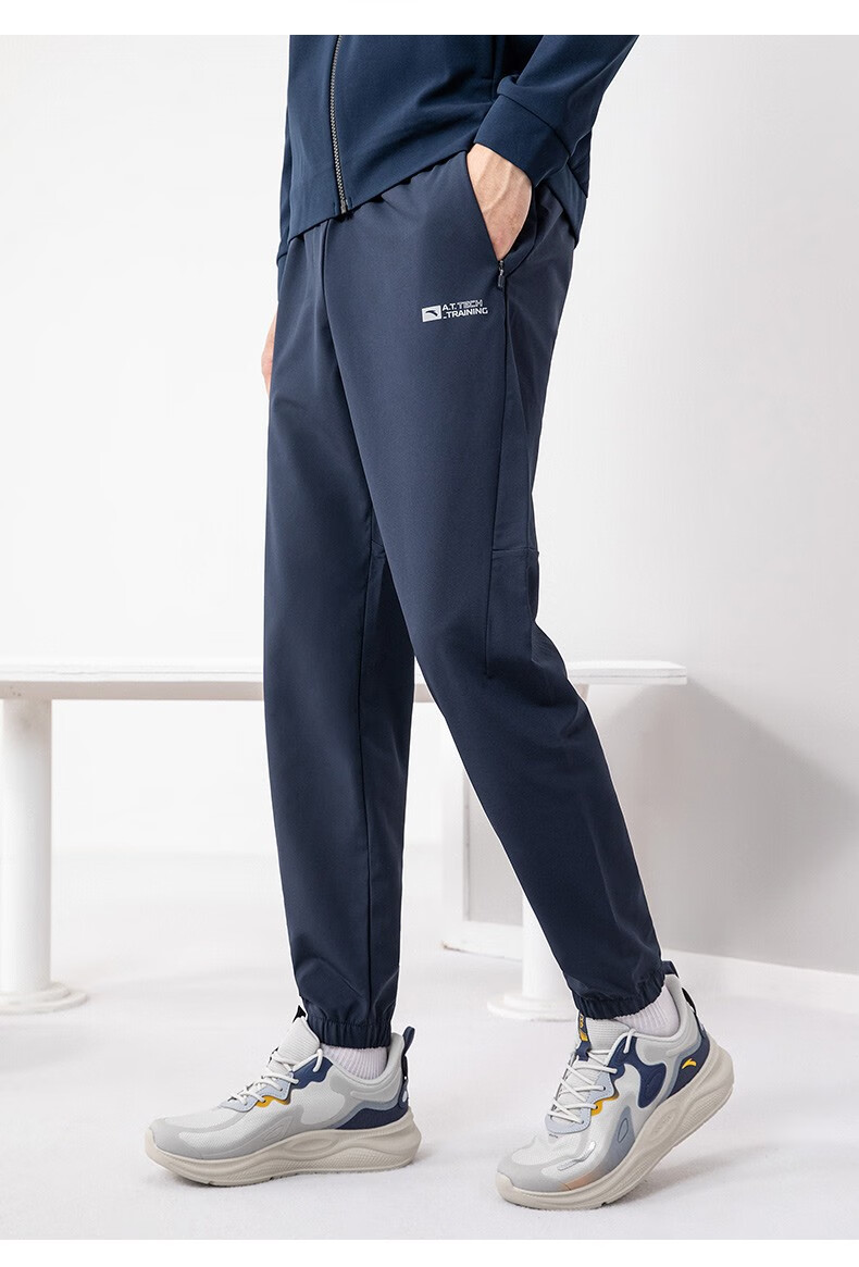 安踏运动裤男春季新款户外运动休闲梭织长裤男子休闲裤子官方旗舰基础