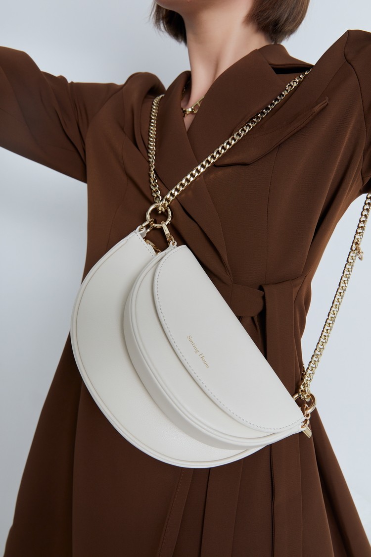 西木汀牛皮链条包包女2021新款潮高级质感洋气小众单肩斜挎马鞍包