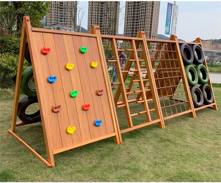 幼儿园户外木质攀爬架儿童蜘蛛网攀岩墙轮胎感统体能训练器材搭配六面