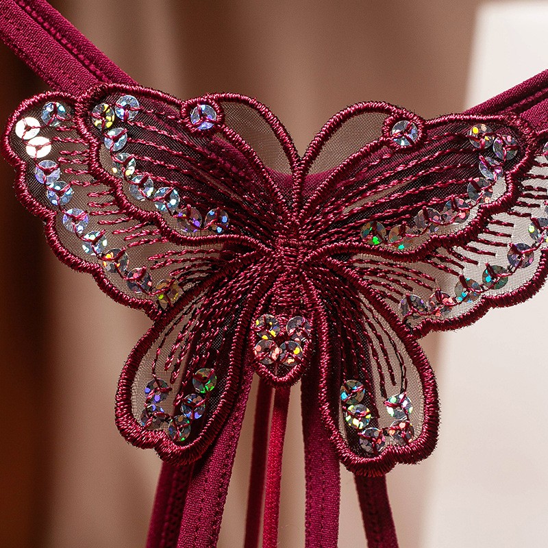 姬欲情趣内裤女蝴蝶亮片开档免脱带珠子按摩丁字裤性感镂空透视t裤