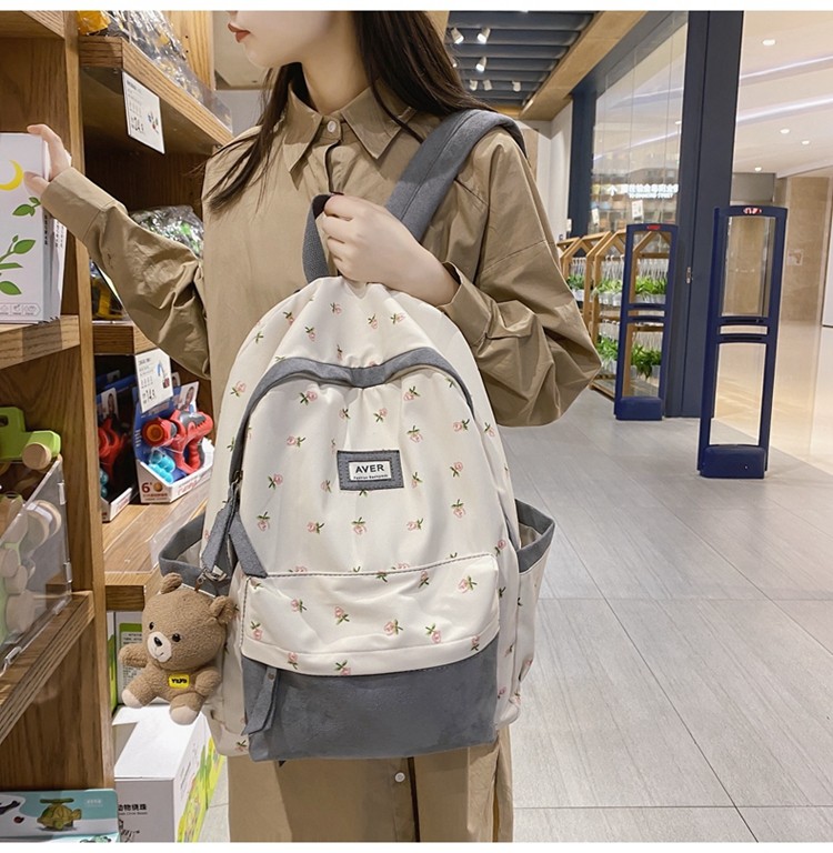 鑫沐书包女初中生韩版简约轻便可爱日系小清新超轻高中学生双肩包