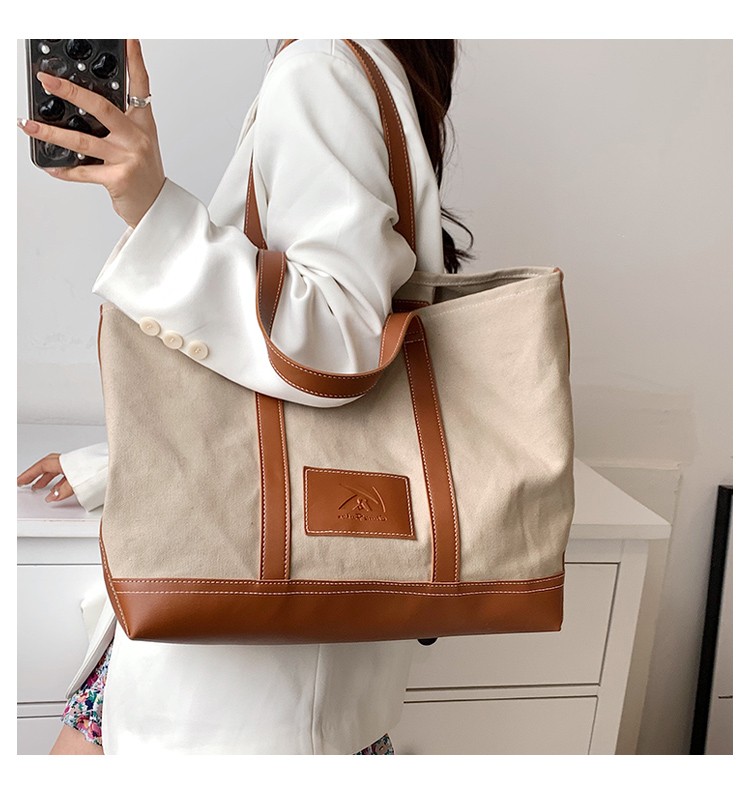 左一仁帆布包女士新款大容量单肩斜挎包简约布包文艺布袋上班通勤出行
