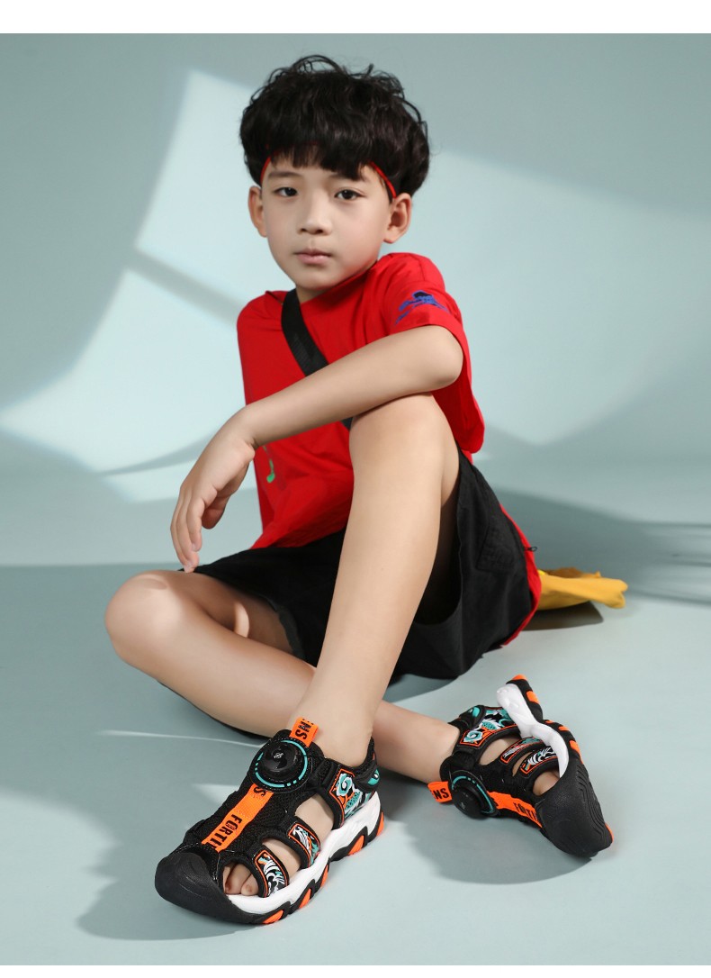 七波辉儿童包头凉鞋男童2022夏季新款中大童旋转纽扣软底沙滩鞋子