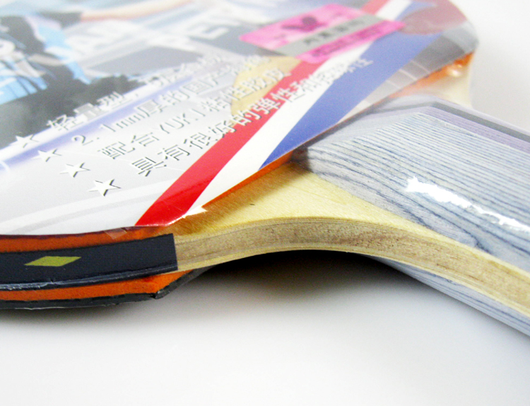 界于传统长胶和生胶之间) 底板:5层纯木 胶皮海绵:yuki粘性胶皮配合2