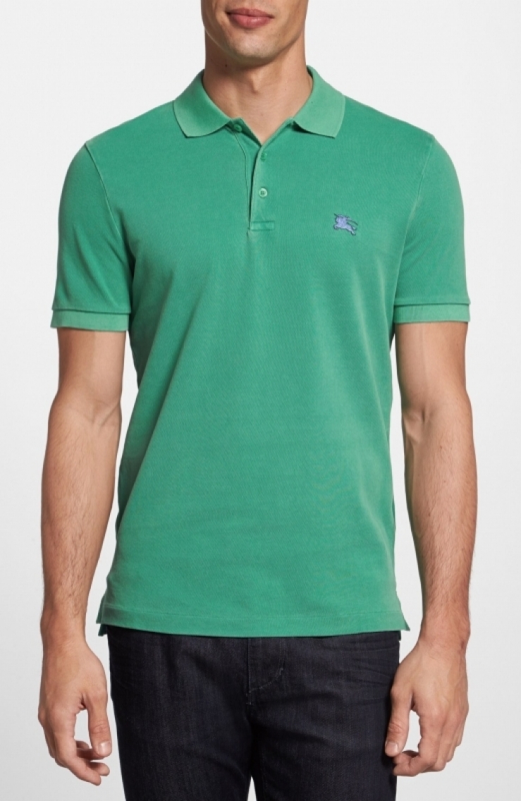 a textured piqué knit shapes a classic polo topped with a