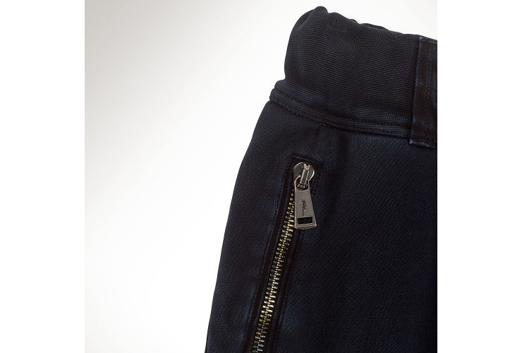 mercerized cotton that has been garment-dyed and acid-washed to