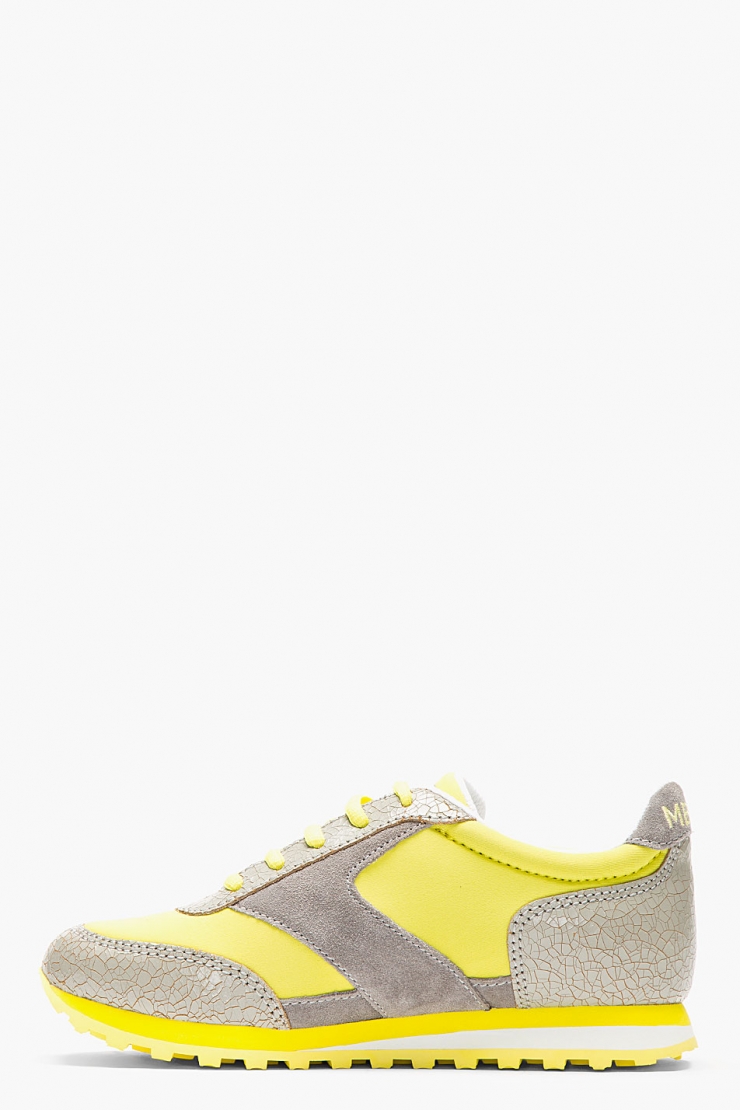 cracked leather panels in grey at lace guard, toe, and heel