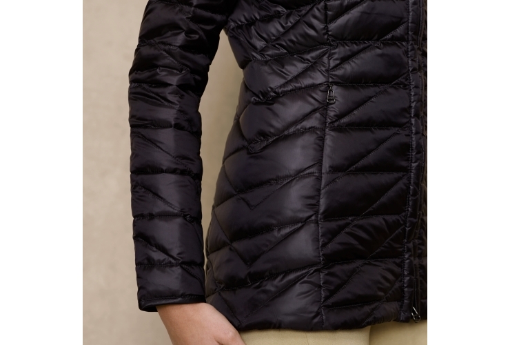 this modern, lightweight down jacket features a zigzag-quilted