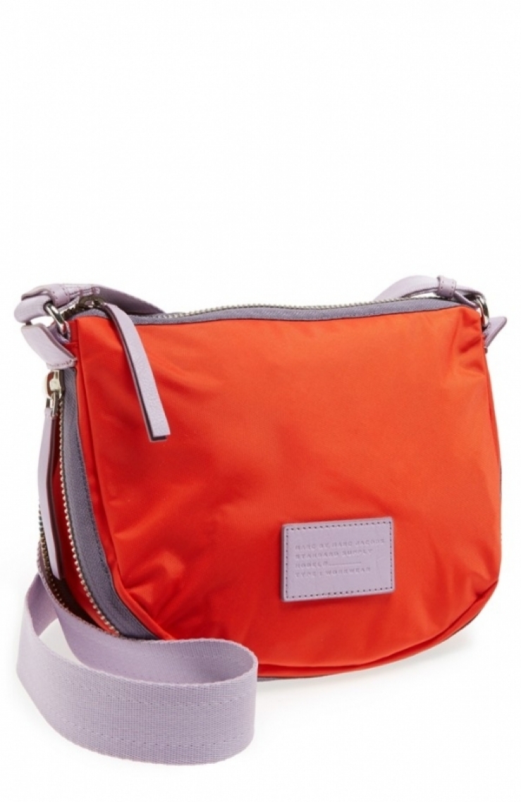 capacity of a modern nylon crossbody with an adjustable seatbelt