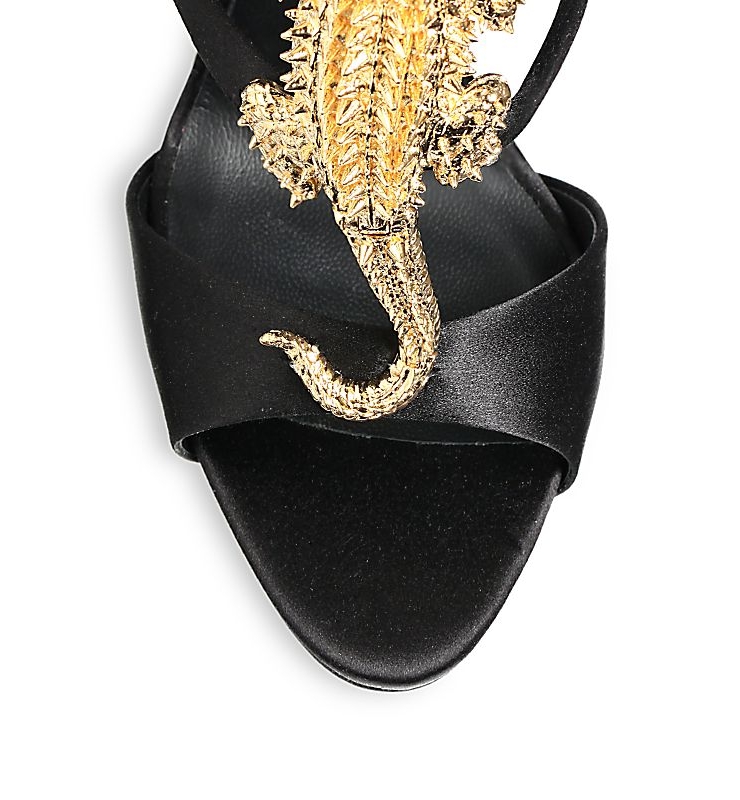 code : q00134980  color : black  a spiked metal alligator clings