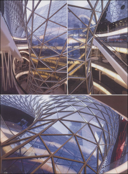 city, an urban shopping street with anew element - verticality