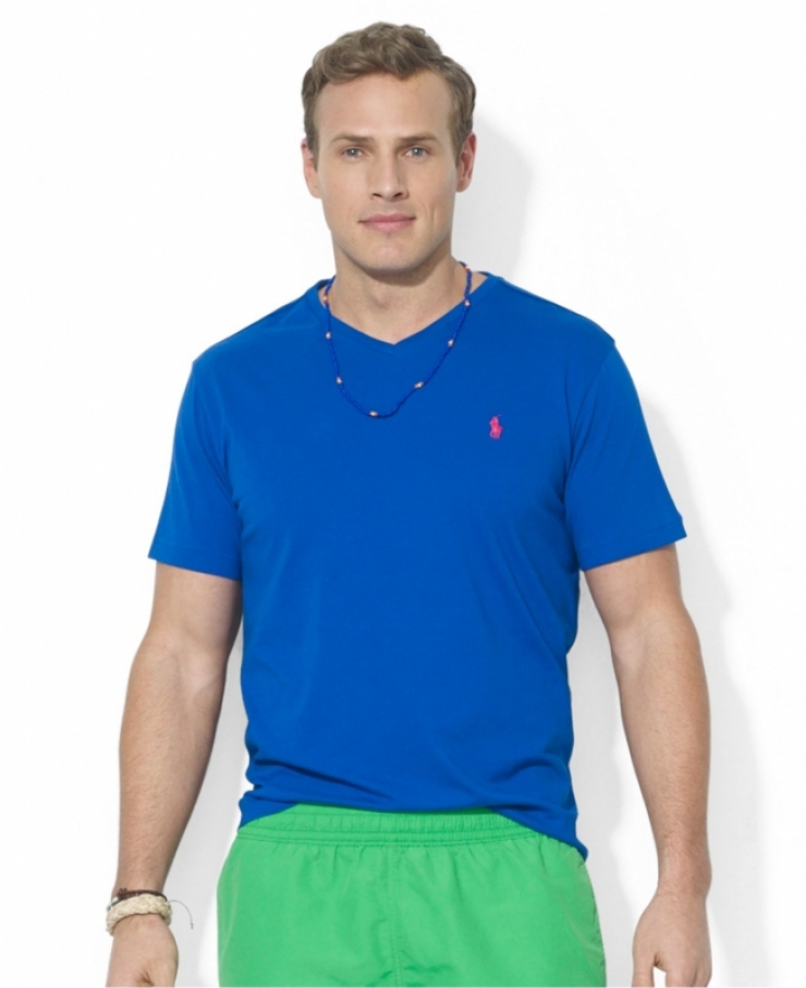 jersey, this vibrant v-neck shirt has a fitted silhouette and