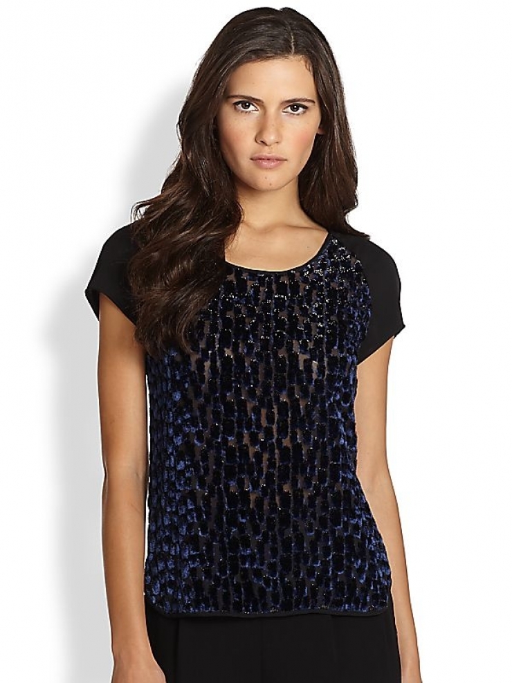 form, this semi-sheer raglan tee is styled with plush velvet