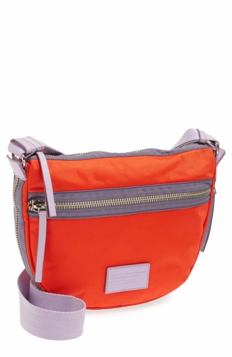 capacity of a modern nylon crossbody with an adjustable seatbelt