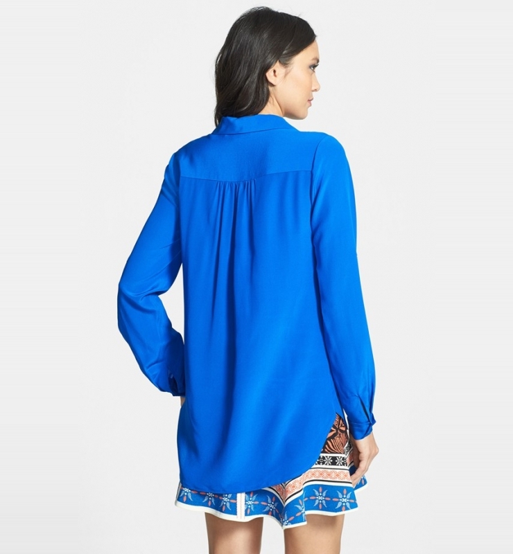 luminous silk showcases the fluid drape of a collared shirt