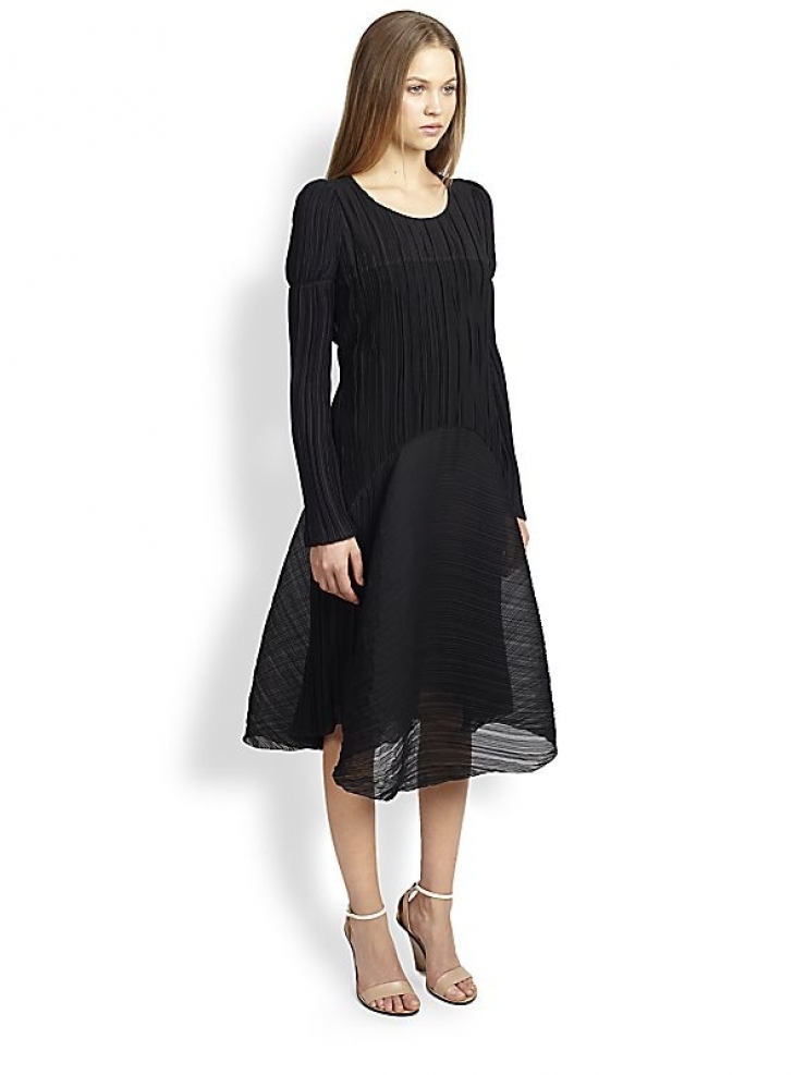 georgette is draped softly upon the figure to produce a fluid