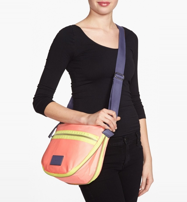 capacity of a modern nylon crossbody with an adjustable seatbelt