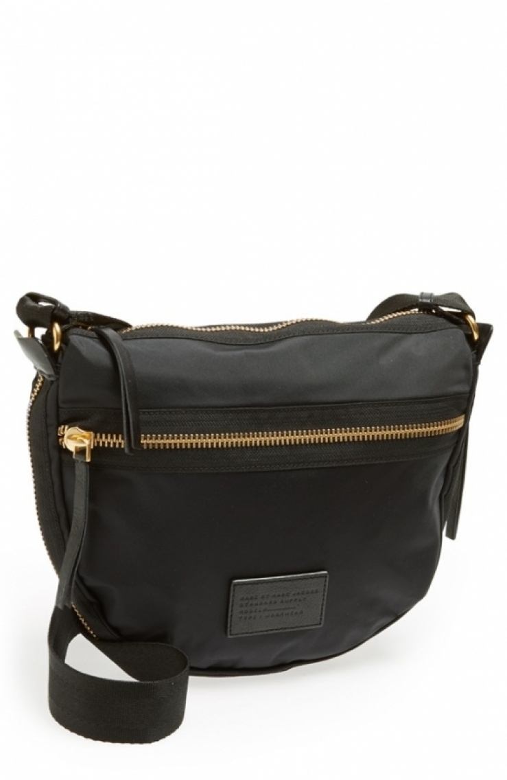 capacity of a modern nylon crossbody with an adjustable seatbelt