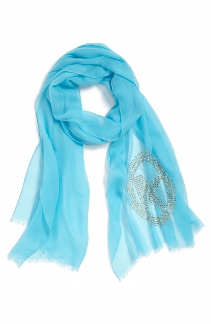 feathery fringe edges a sweeping scarf softened with a touch of