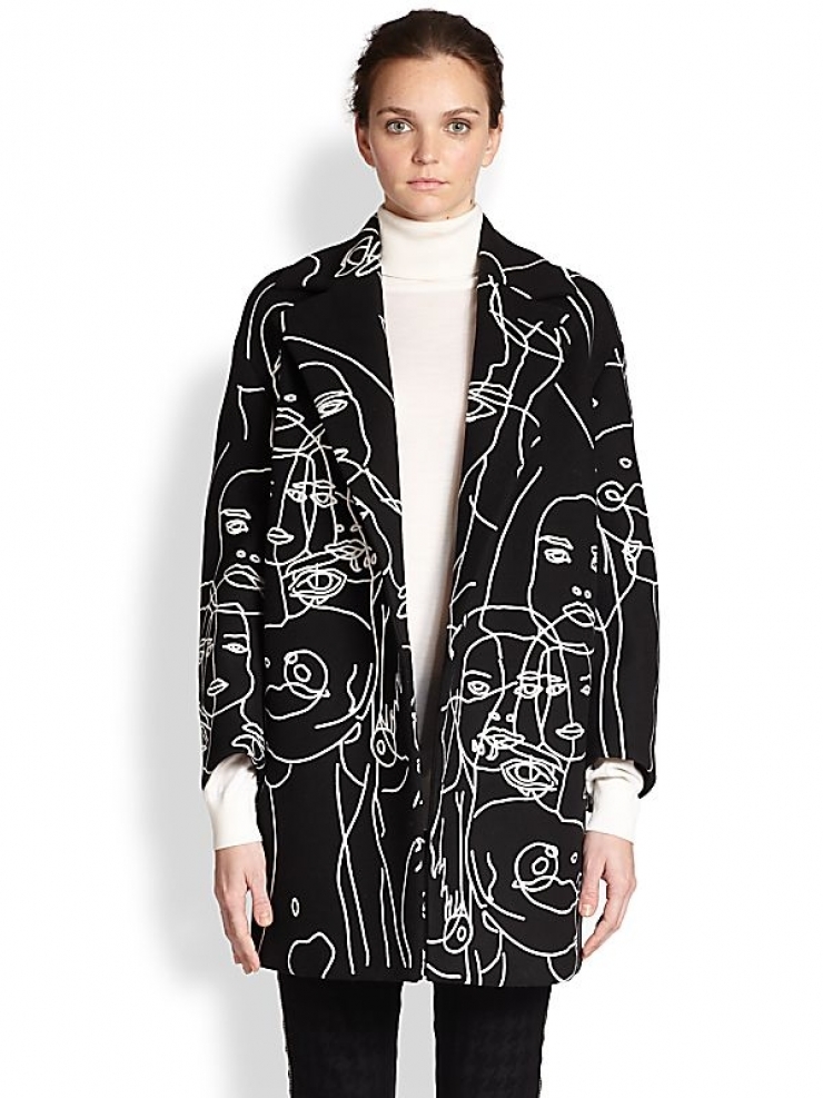 color : black  an oversized felted wool design, emblazoned