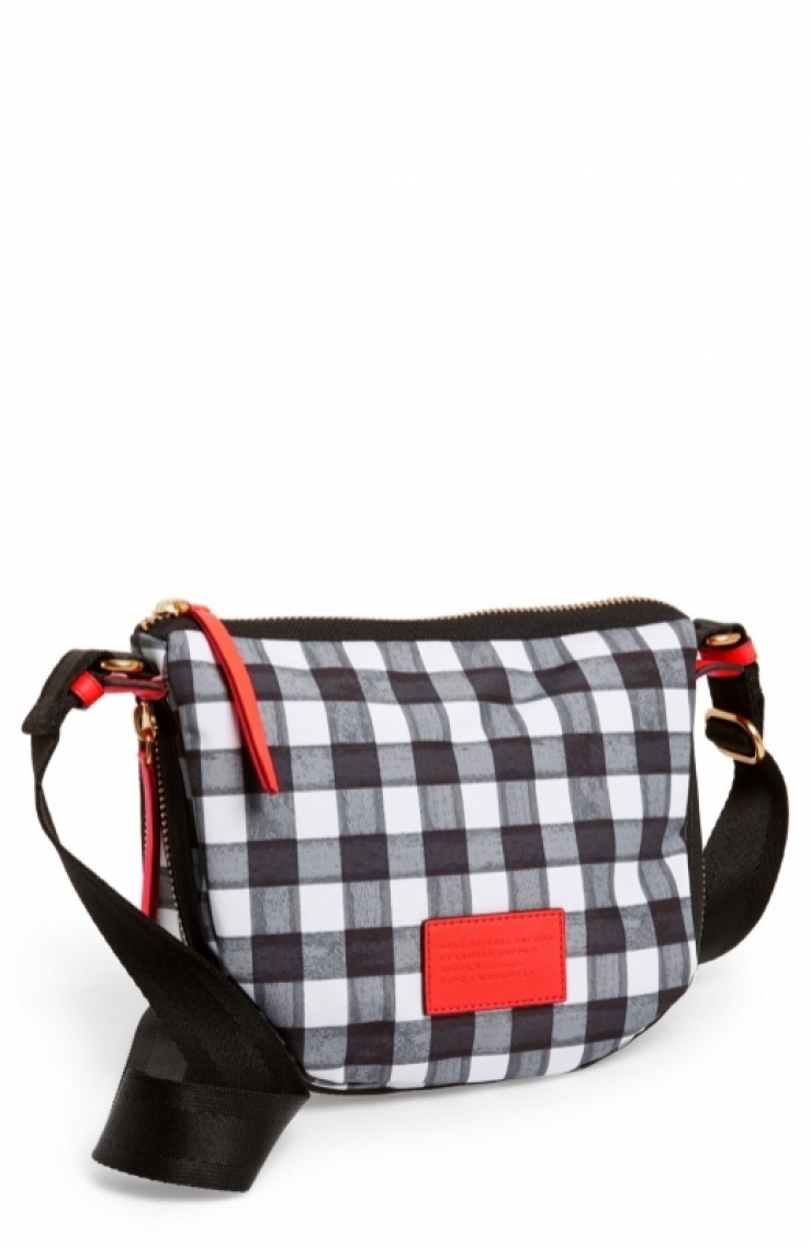 capacity of a modern nylon crossbody with an adjustable seatbelt