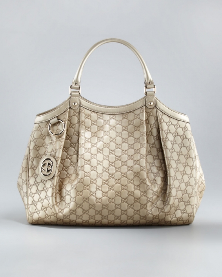 品牌:古驰 gucci 产地:意大利 款式:女式手提包 产品颜色:香槟酒色