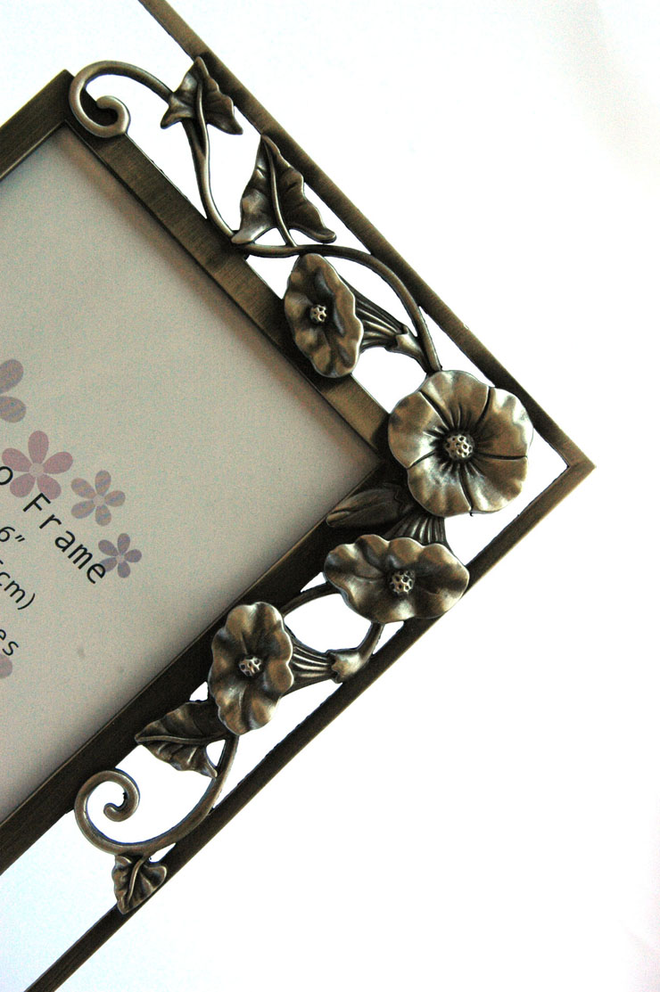 妙诺 铁艺镂空6寸相框(边角喇叭花款)