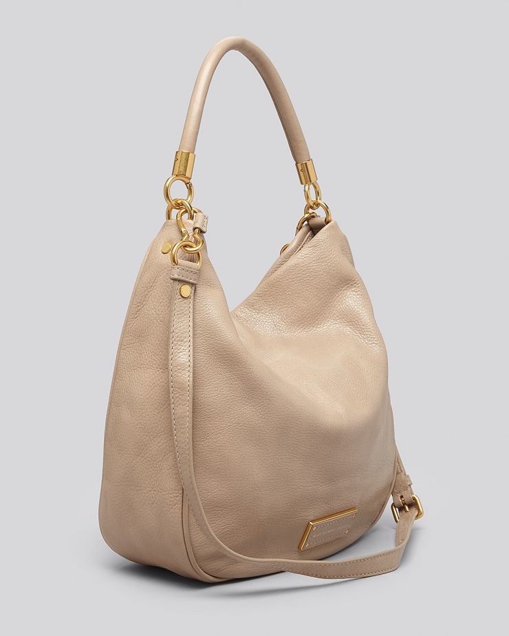 boasting a chic shape and ample square footage, this bag is