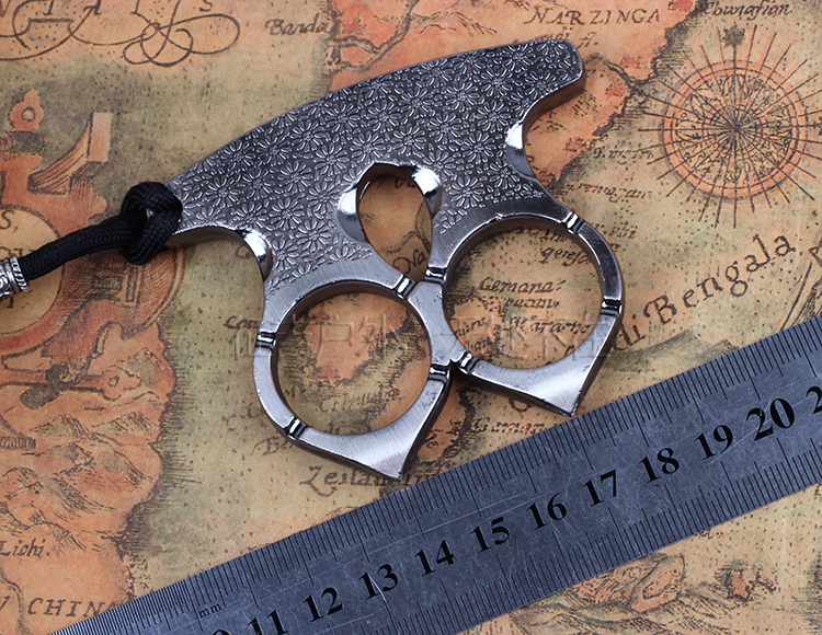 厚度:约8mm;重量100g 产品描述: 一,拳刺亦指铁拳头,俗称手撑子,指虎