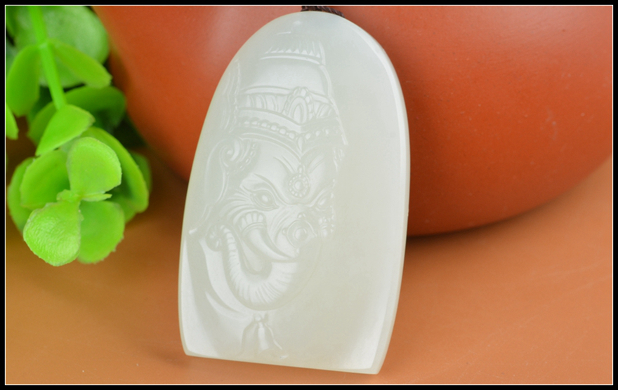 玉雕大师蒋宏利作品 和田玉 断牙象神头 挂件 重26.