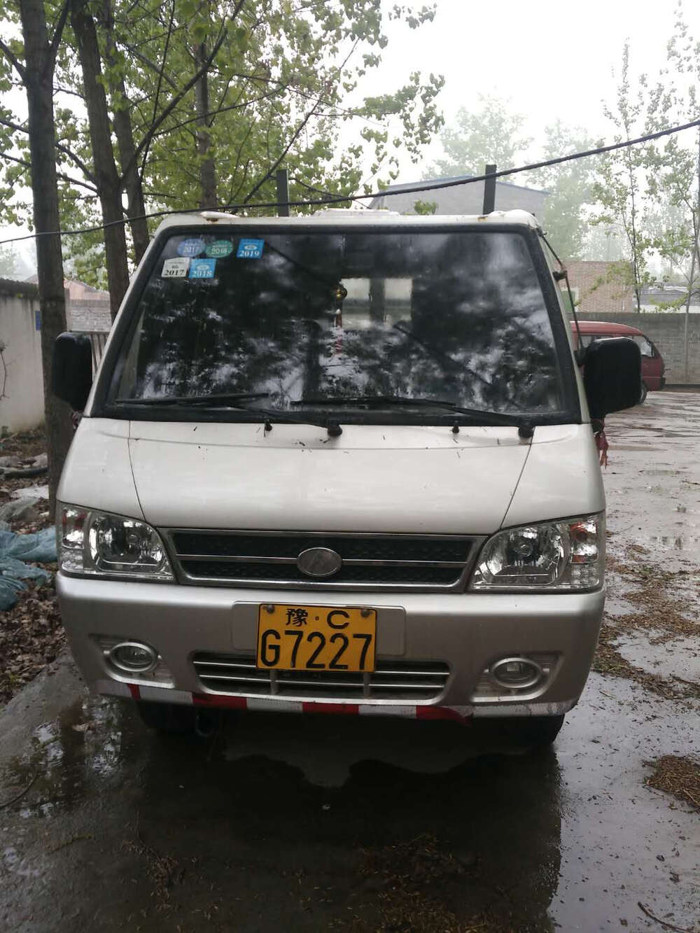 号牌为豫cg7227奥峰牌普通低速货车一辆