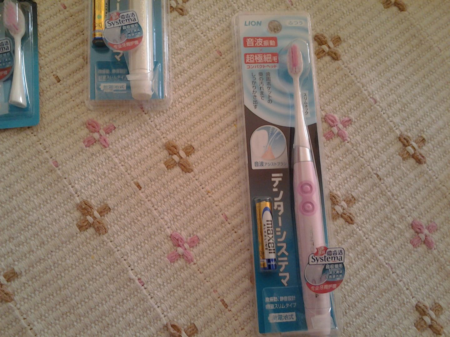 狮王（Lion）狮王电动牙刷细齿洁声波振动超细毛牙刷细软毛静音便携干电池 粉色 1支 新包装 实拍图