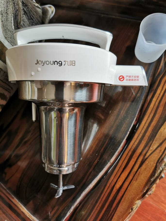 九阳Joyoung豆浆机1-1.2L全钢无网家用多功能榨汁机豆浆机DJ12A-D2100