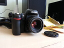 尼康AF-S DX标准定焦镜头我的D5200,买35mm 1.8的还是50mm 1.8的合适？