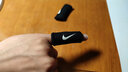 耐克（NIKE）耐克护指套篮球护手指套NIKE飞人AJ指关节排球防滑Jordan护具护指 耐克勾勾黑色NKS05010 S两只装 实拍图