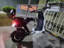 电动车后座包电瓶摩托车专用雨衣收纳箱后货架驮包储物尾架包 7031#驮包（PU黑色-反光款） 实拍图