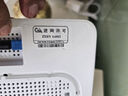 中兴光器由WiFi6+3000M壁挂路由G1612带挂件与主路由G7615光纤组网 中兴G1612电信版 实拍图