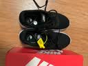 耐克（NIKE）女鞋运动鞋 TANJUN网面透气跑步鞋低帮休闲缓震跑鞋 经典黑白情侣/新老款混发 36.5 实拍图