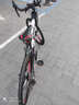 WELLCLS死飞自行车男公路车山地车实心胎成人变速单车弯把女学生WELLCLS 27速一体轮黑红色【带骑行豪礼】 26寸【适合身高165-185cm】 实拍图